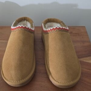 The perfect slip-on mule for cold weather coziness.